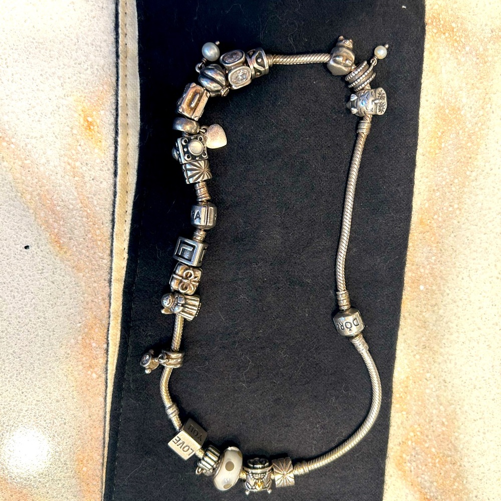 Double Pandora bracelet with 19 charms.